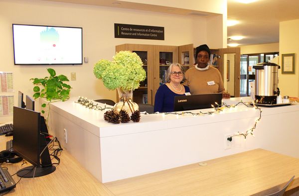 Our Community Resource and Information Centre with two volunteers